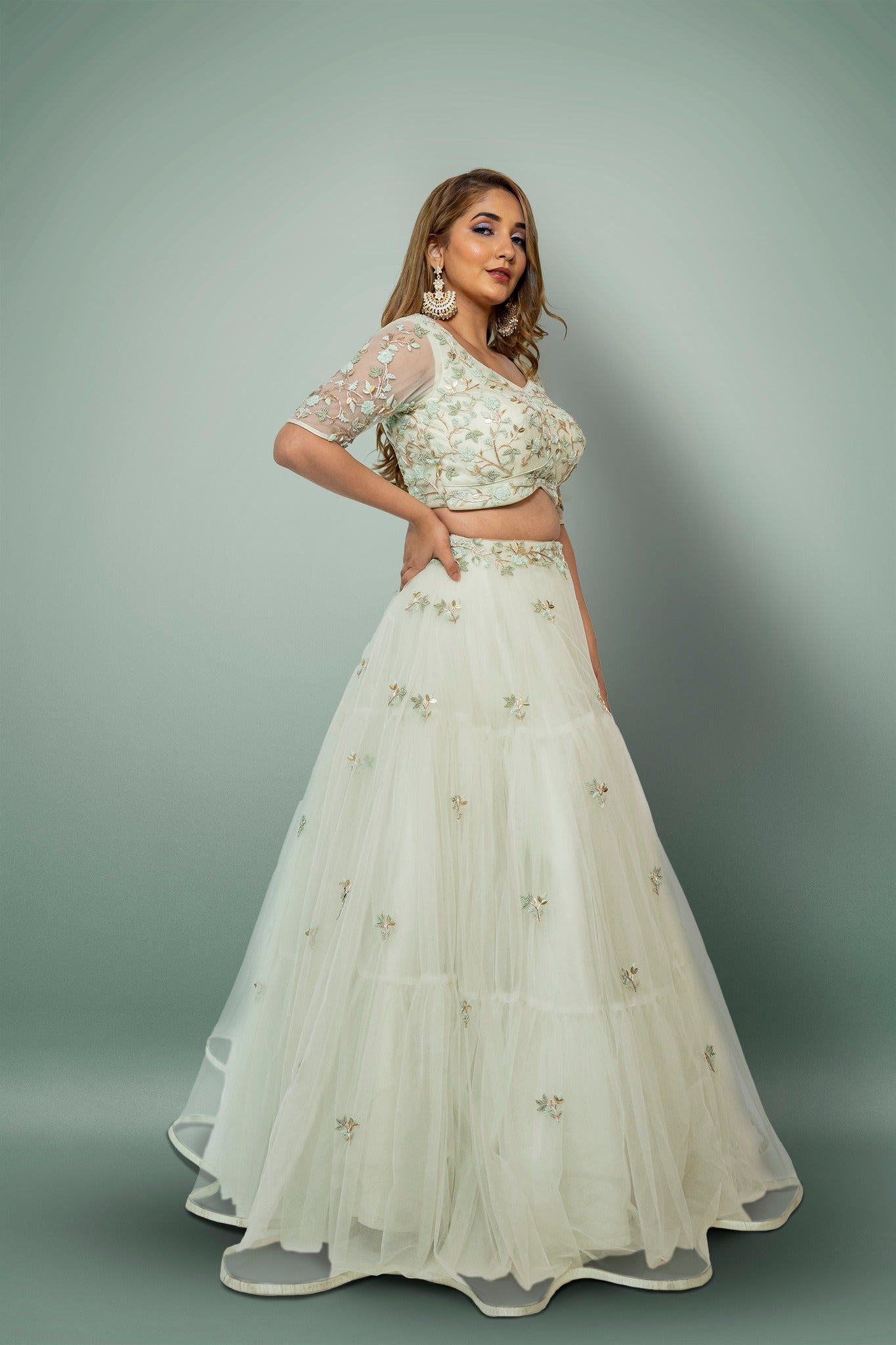 Sea Green Lehenga And A Crop Top Set In Floral Motifs Embroidery, Crafted In Net