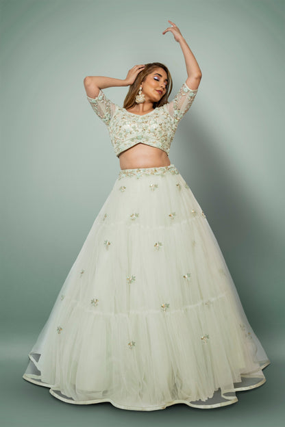 Sea Green Lehenga And A Crop Top Set In Floral Motifs Embroidery, Crafted In Net