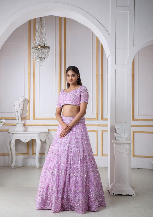 Lavender Lehenga Choli In Organza In Self And Silver Work With A Matching Net Dupatta