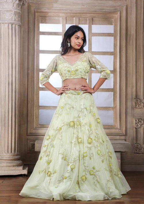 Pastel Yellow Lehenga Blouse With Self Work And A Matching Dupatta