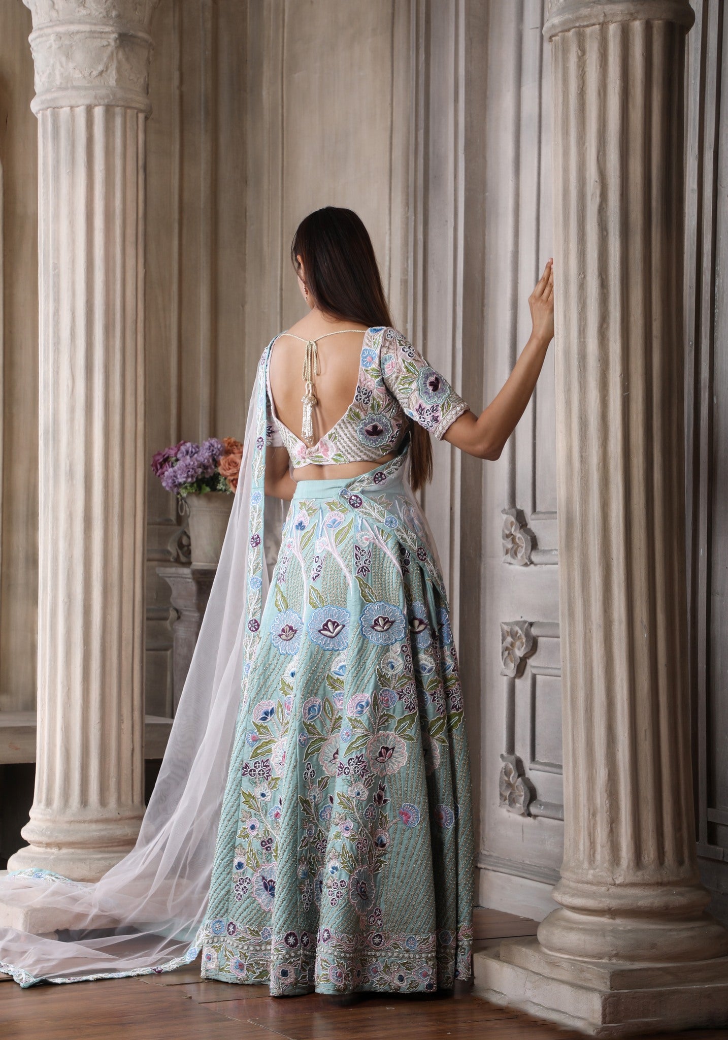 Black one shoulder blouse, pastel blue lehenga – Sapana Amin