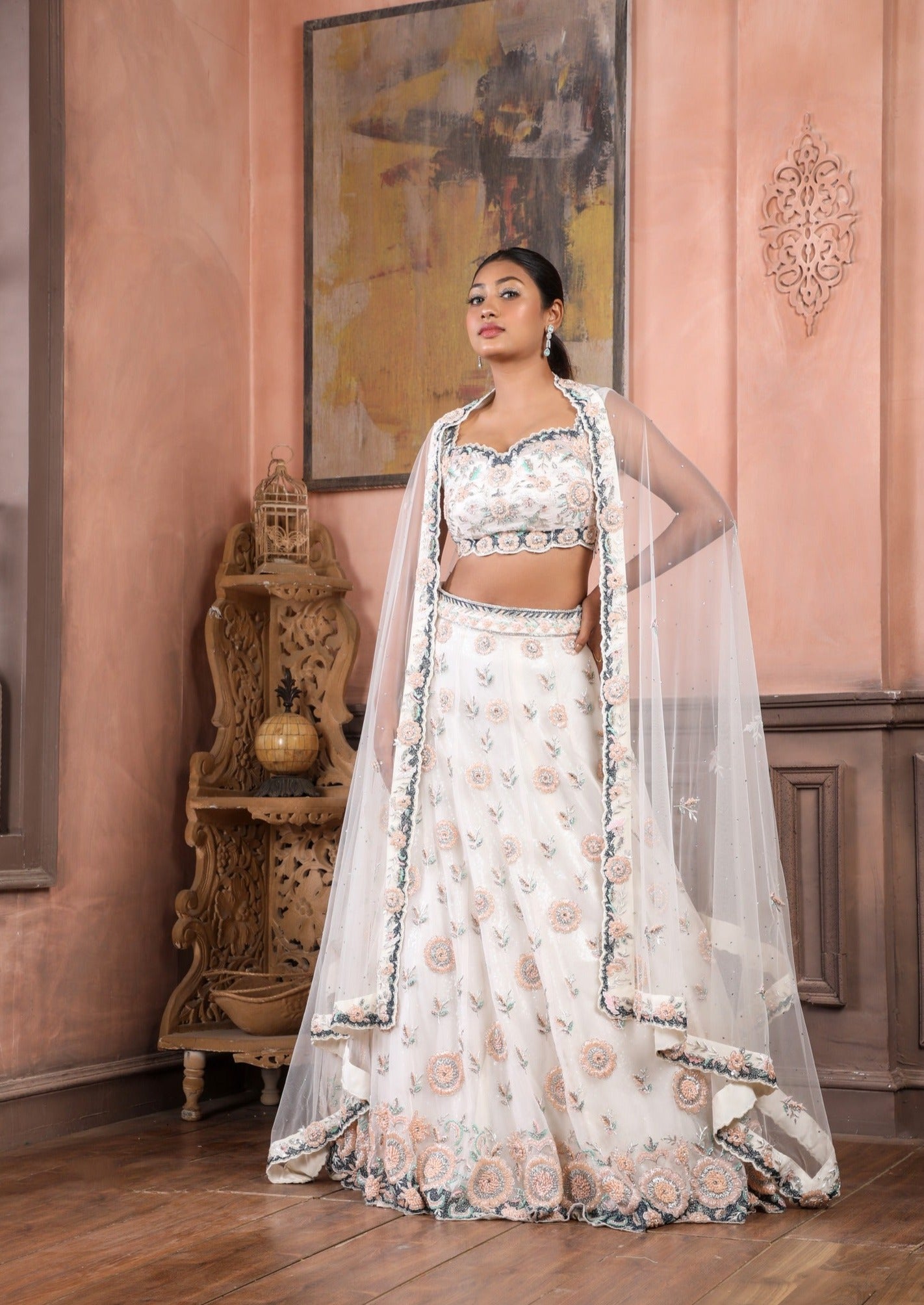 Off White Embroidered Lehenga with sweetheart neckline