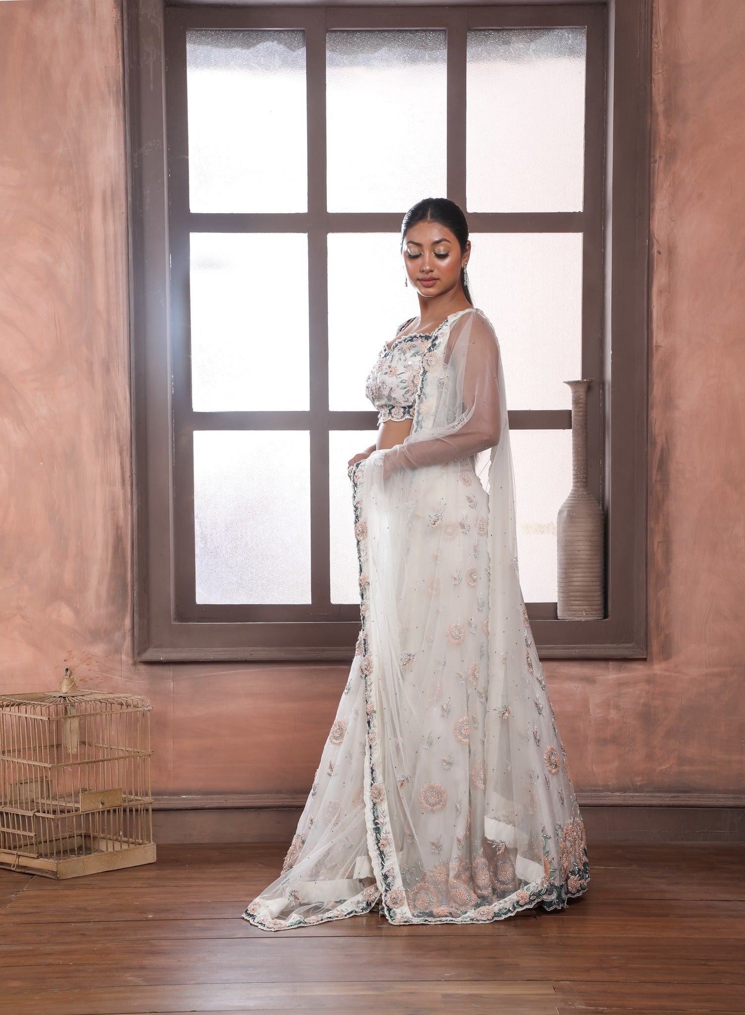 Off White Embroidered Lehenga with sweetheart neckline