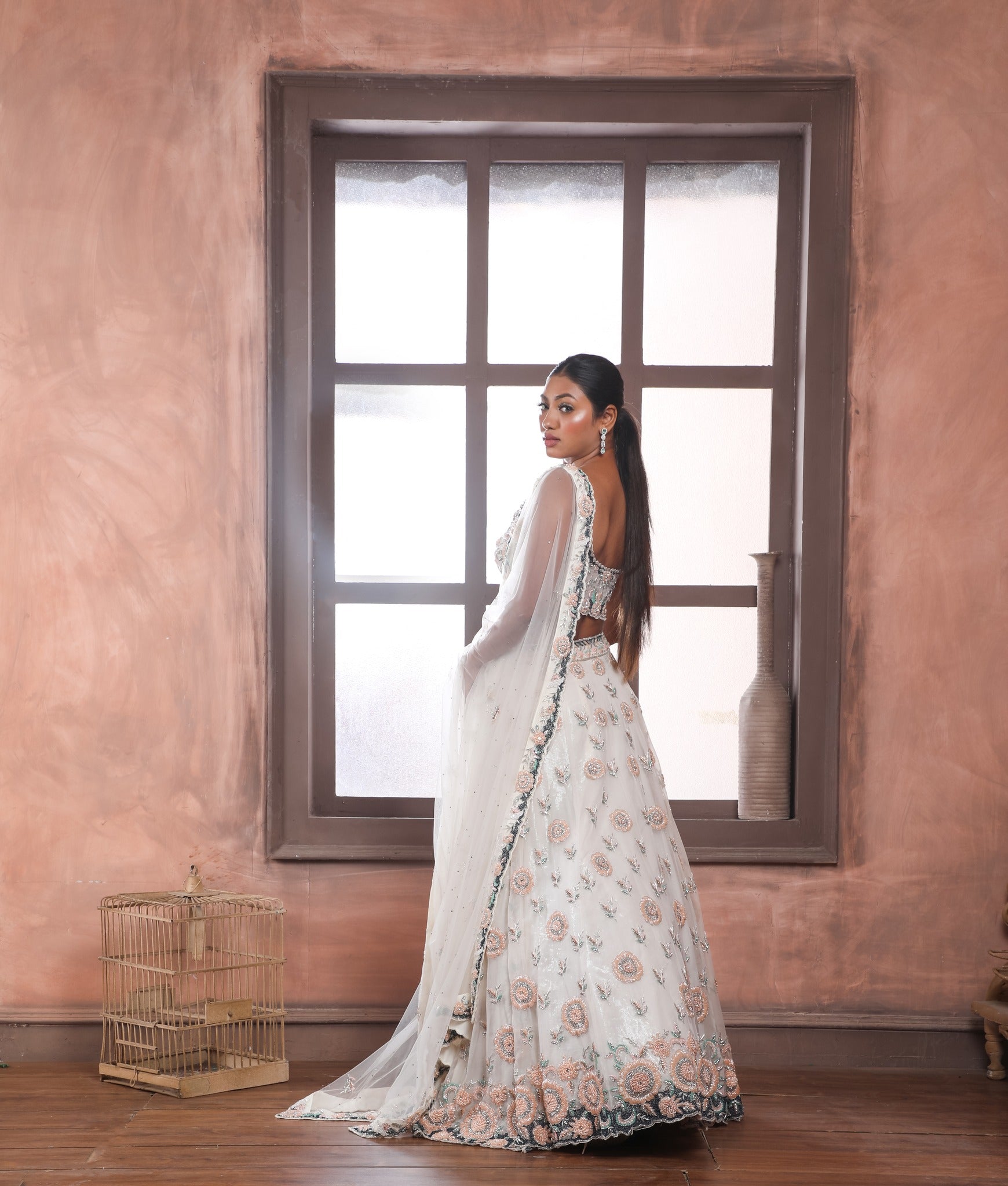 Off White Embroidered Lehenga with sweetheart neckline