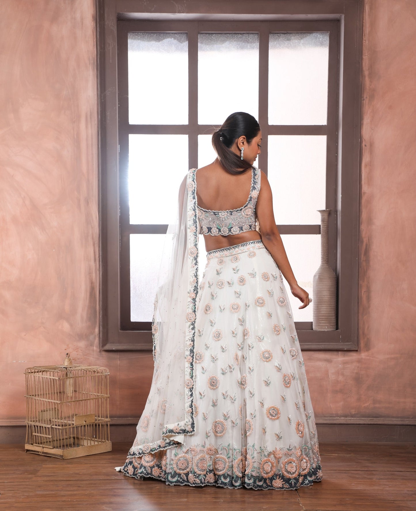 Off White Embroidered Lehenga with sweetheart neckline