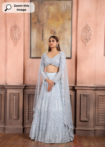 Maya Blue Lehenga Set With Salli,Pot,Kutdana,& Sequins Work In Geometric Pattern