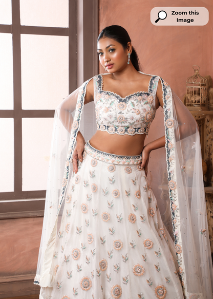 Off White Lehenga Blouse With Embroidered Floral Border And Cutdana Buttis