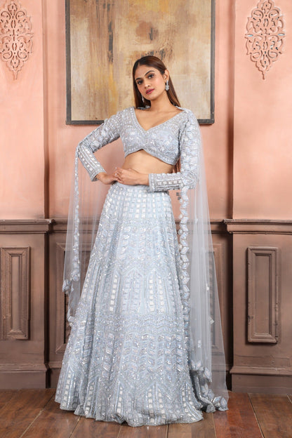 Maya Blue Lehenga Set With Salli,Pot,Kutdana,& Sequins Work In Geometric Pattern